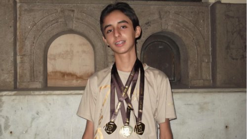 Wesley com medalhas da OBMEP, após a competição de 2012.